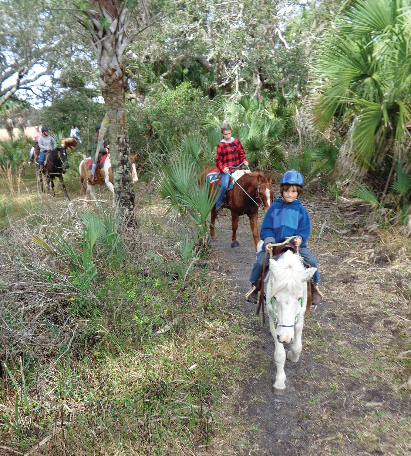 OKEECHOBEE — The annual Trot for Toys event takes place at Kissimmee Prairie Preserve State Park. Participants bring their own horses.